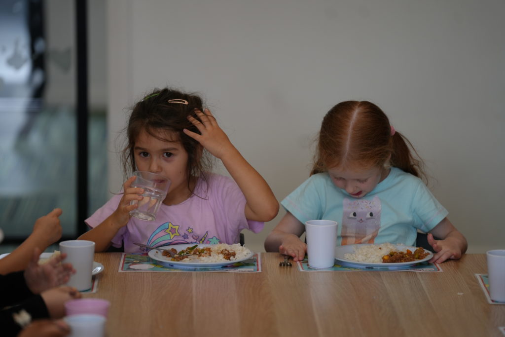 children eating at their daycare